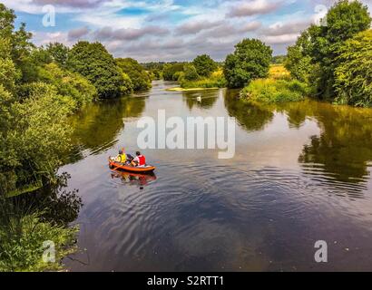 Canoeing on the river Stour, Nr Wimborne. UK. Stock Photo