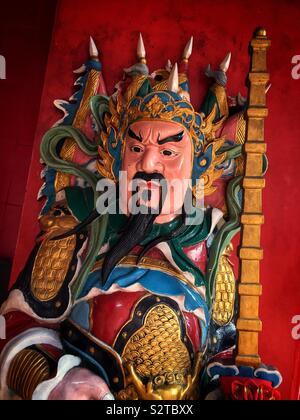 Traditional Chinese menshen, or door gods, decorate the entrance to the Tua Pek Kong Taoist Temple in the old Main Bazaar, Kuching Waterfront, Sarawak, Malaysia Stock Photo