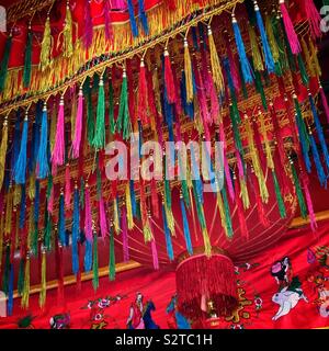 Lanterns and tapestries decorate the Tua Pek Kong Taoist Temple in the old Main Bazaar, Kuching Waterfront, Sarawak, Malaysia Stock Photo