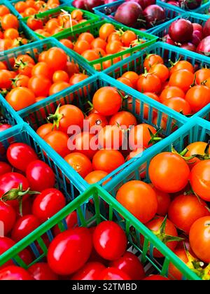 Three kinds of cherry tomatoes at s farmers market Stock Photo