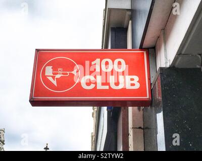 Entrance sign to the Hundred or 100 club, Oxford Street, London, England, United Kingdom. Stock Photo