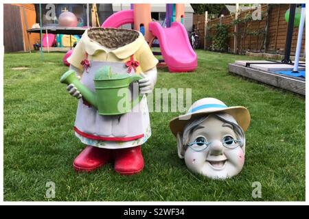 Broken gnome Stock Photo - Alamy