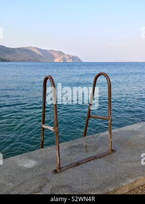 Diving board to the sea. Symi island. Greece Stock Photo