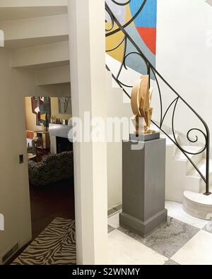 Entry to the living room on the left, sculpture and staircase on the right, Frelinghuysen Morris House & Studio, Lenox, Massachusetts, United States Stock Photo