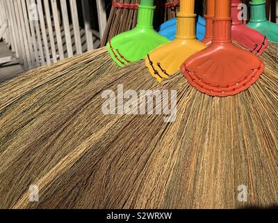 Colourful brooms Stock Photo