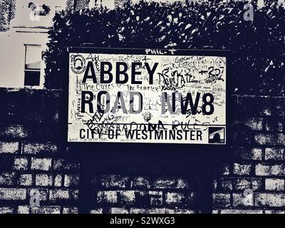 Graffitis on Abbey road  street sign in London, England Stock Photo