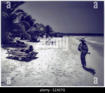 Busking on Jamaica’s Negril Beach. Stock Photo