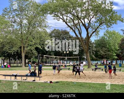 People playing volleyball in Jarry Park, Montreal Stock Photo