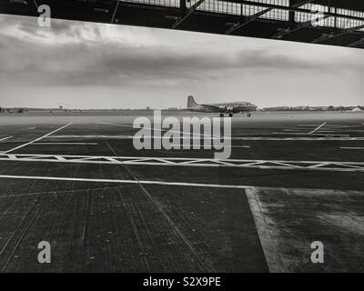 Tempelhof Airport, Berlin, Germany. Berlin‘s old airport was involved with the Berlin airlift. Architectural feature is the canopy that protected boarding passengers from the weather. Stock Photo