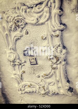 Vintage ornate electric light switch Stock Photo