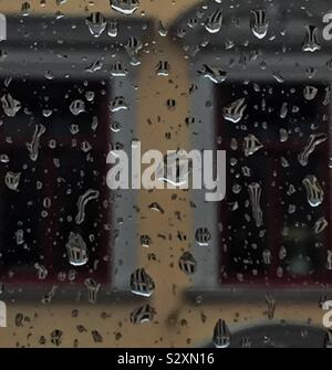 Raindrops on window glass. Stock Photo