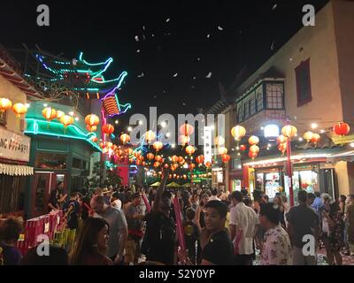 LOS ANGELES, CA, SEPT 2019: street fair with crowd of people, lights and lanterns, in Chinatown Stock Photo