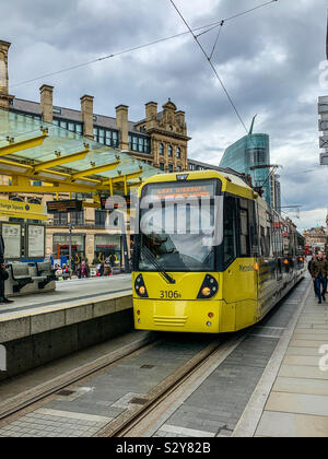 Metro link tram at Exchange Square tram stop in Manchester Stock Photo