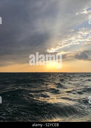 Sunset over the ocean. Stock Photo