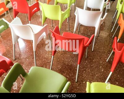 colored chairs in a room Stock Photo