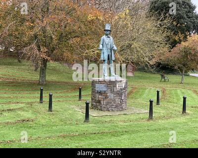 Isambard Kingdom Brunel’s statue at Neyland surrounded by lines of leaves Stock Photo