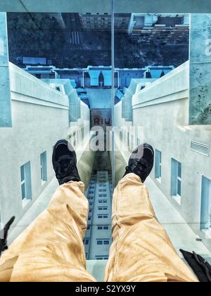 Looking down 55 floors through the glass floor Stock Photo