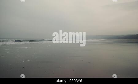 Humanby Gap Beach on a misty December afternoon, East Riding of Yorkshire Stock Photo