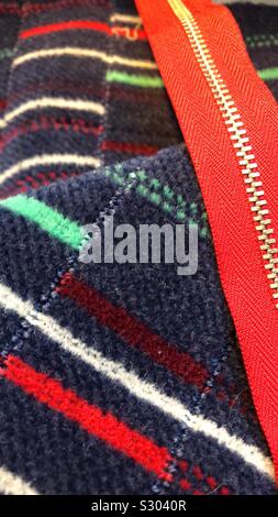 Striped wool moquette fabric with zipper ready for sewing craft project Stock Photo