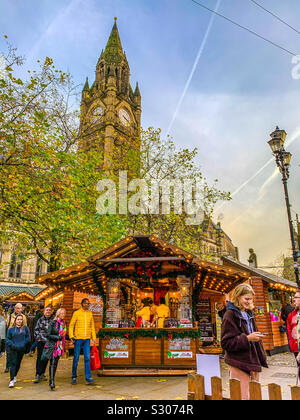 Manchester Christmas market on Albert Square with town hall in view