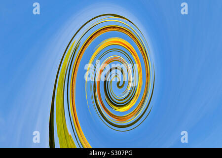 abstract graphic representation of a gree, yellow amd black coloured spiral on blue background like a sky.  The conceptual structure consists of different lights