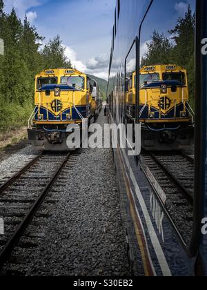 Two trains meet in Alaska Stock Photo