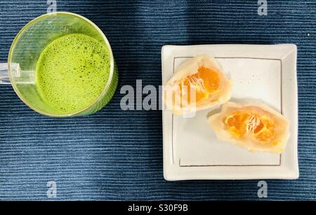 Matcha and tangerine daifuku Stock Photo