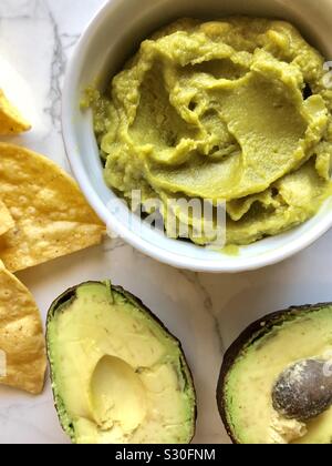 Guac and chips Stock Photo