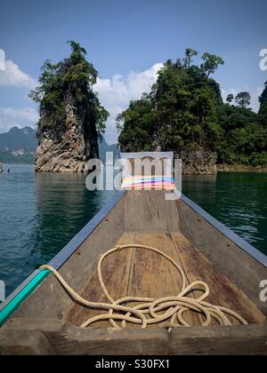 Long tail boat at Cheow Lan Lake at Khao Sok National Park, Thailand Stock Photo