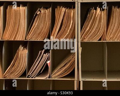 Bins full of Manila folder files and paper Stock Photo