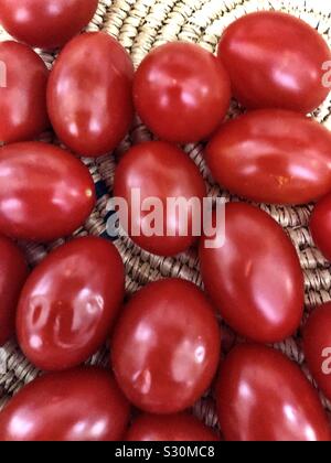 Baby plum tomatoes Stock Photo