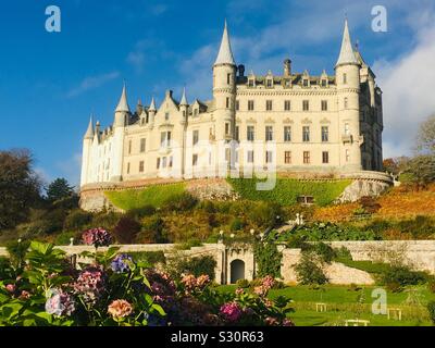 Looking up at the towers and turrets of Dunrobin Castle, Golspie, Scotland Stock Photo