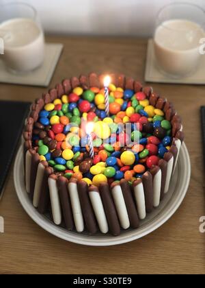 Pinata Surprise Cake With M&M's Inside - Anjali's BakeAffair