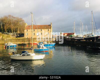 Dysart Harbour, Kirkcaldy, Fife, Scotland with sailing boats and the historic Harbourmaster’s House Stock Photo