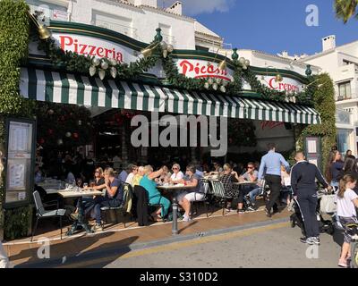 pretty empty market in the city center of Puerto Banus, Spain Stock Photo -  Alamy