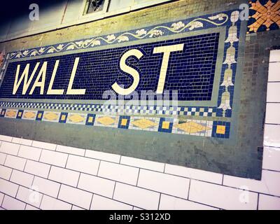 Tiled sign wall at the wall street station on the four and five line in the financial district, NYC, USA Stock Photo