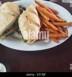 Sub sandwich and sweet potato fries Stock Photo