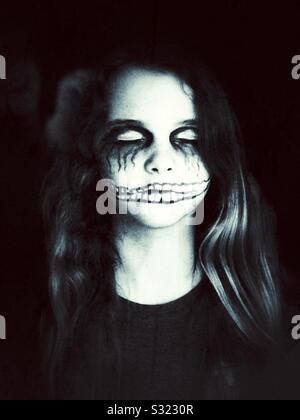 12 year old girl in creepy Halloween makeup Stock Photo