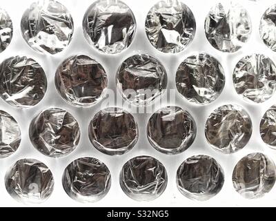 An abstract close up of bubble wrap packaging with copy space Stock Photo