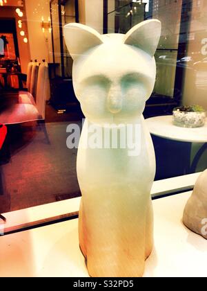White cat figurine in in the shop in Spisske Podhradie, Slovakia ...