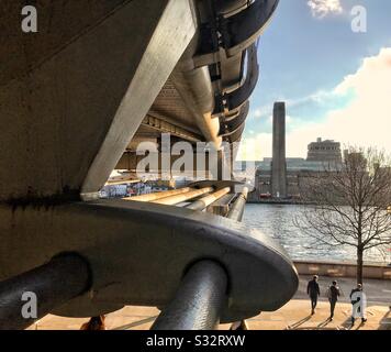 View along the Millennium Bridge, London, looking towards Tate Modern art gallery. Stock Photo