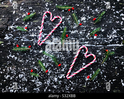 Christmas decorations: heart shaped candy canes Stock Photo