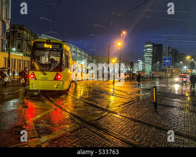 Metrolink tram leaving Victoria train station in Manchester City centre