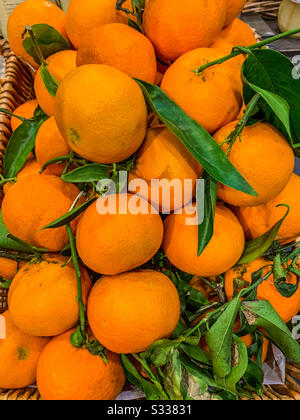 Oranges in basket Stock Photo