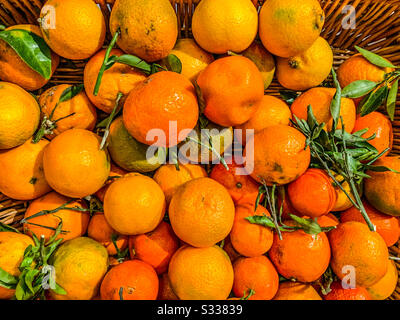 Oranges in a basket Stock Photo