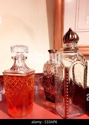 Decanters at an upscale residential bar set up Stock Photo