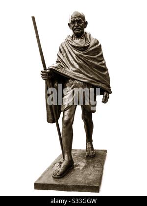 Mahatma Gandhi bronze statue in Manchester, UK.  By artist Ram V Sutar.  Background removed on iPhone app Stock Photo