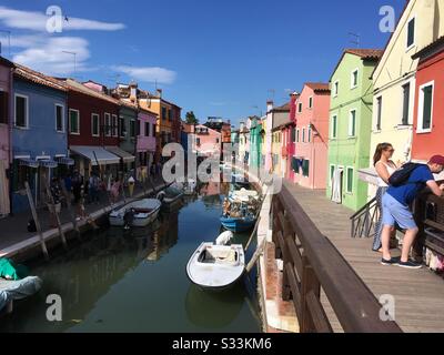 View from a bridge across a canal in Burano. Stock Photo
