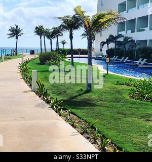 Path past Pyramid Building Swim-Up Suites, Hyatt Ziva Resort, Cancun, Quintana Roo, Yucatan Peninsula, Mexico Stock Photo