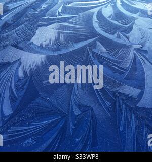 Ice patterns on a car roof Stock Photo